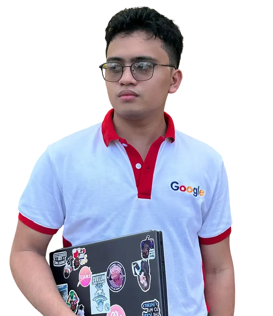 Harold Rhey Pisos holding a laptop